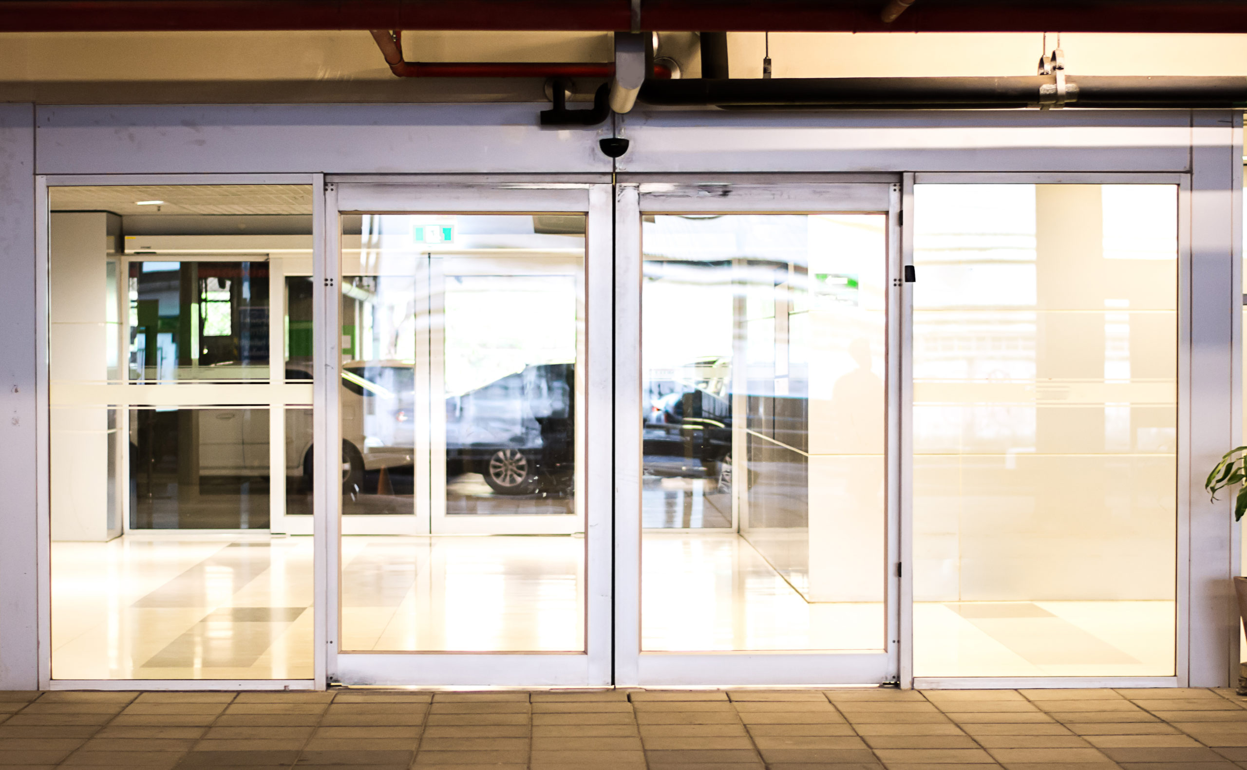 Blank,Sliding,Glass,Doors,Entrance,At,Airport.glass,Doors,In,An